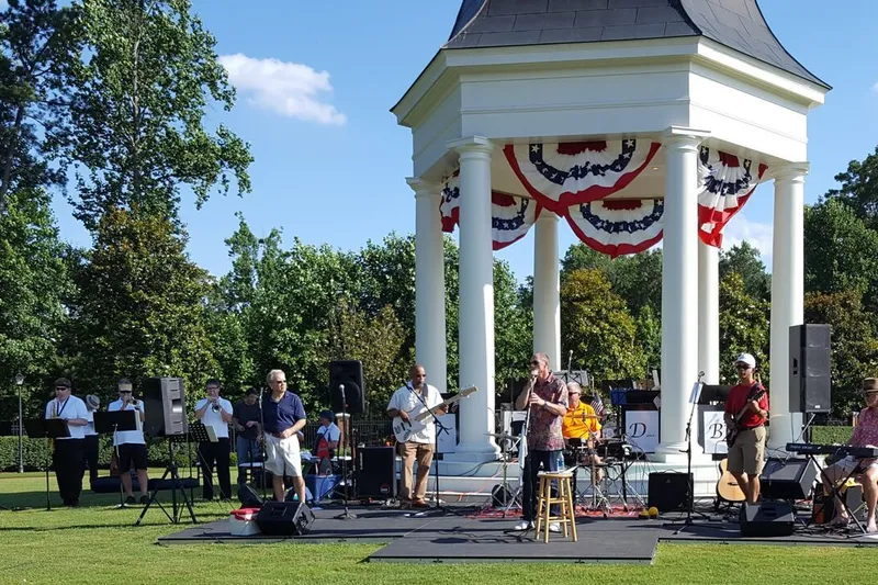 Residents enjoying a community concert at Ford's Colony
