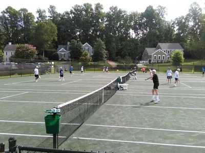 Residents playing tennis